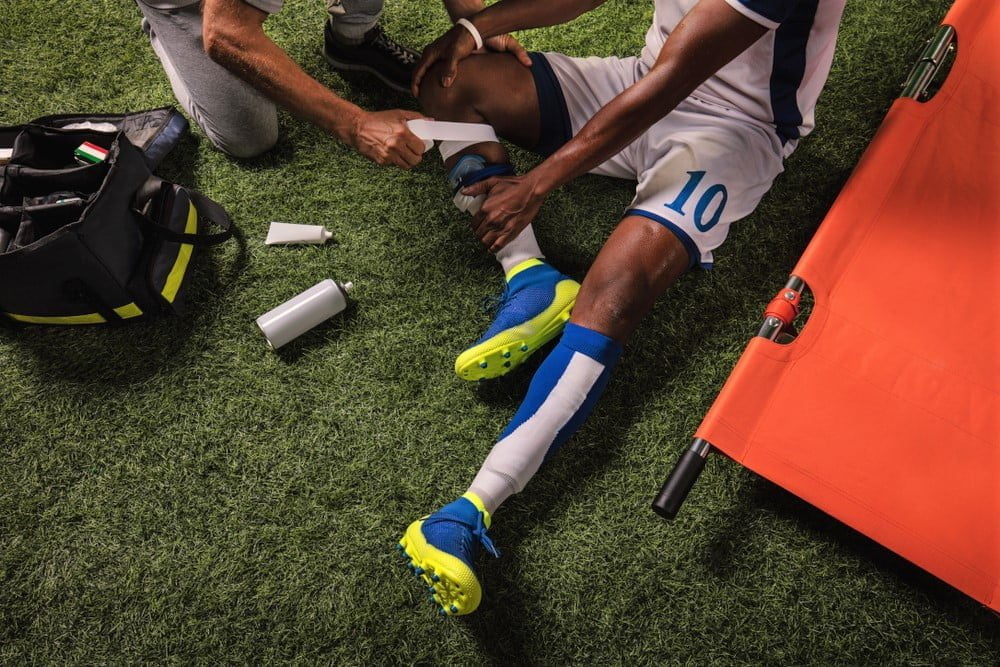 Soccer,Player,Injured,Knee,During,The,Game.,Sport,Doctors,Provide